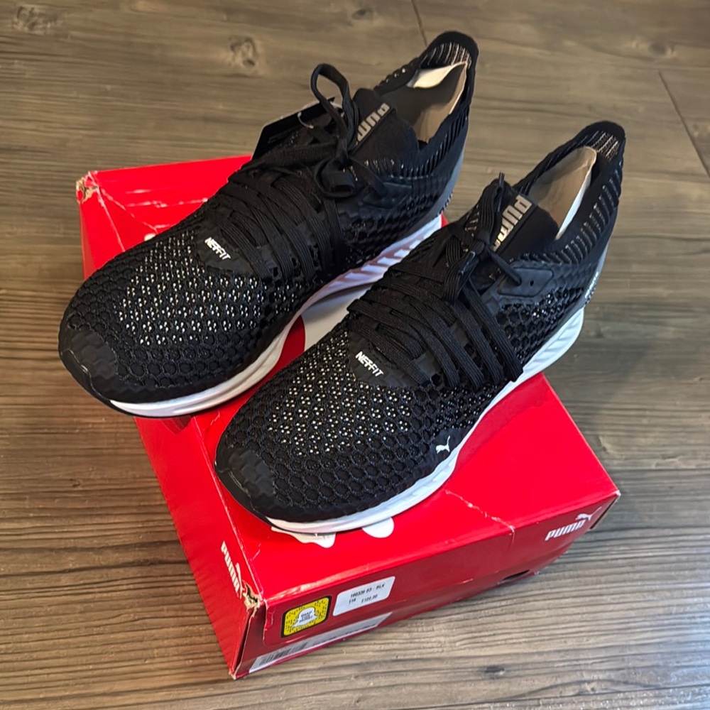 NWT

Puma Black Ignite Netfit Sneakers with Breathable Mesh and Cushioned Sole.